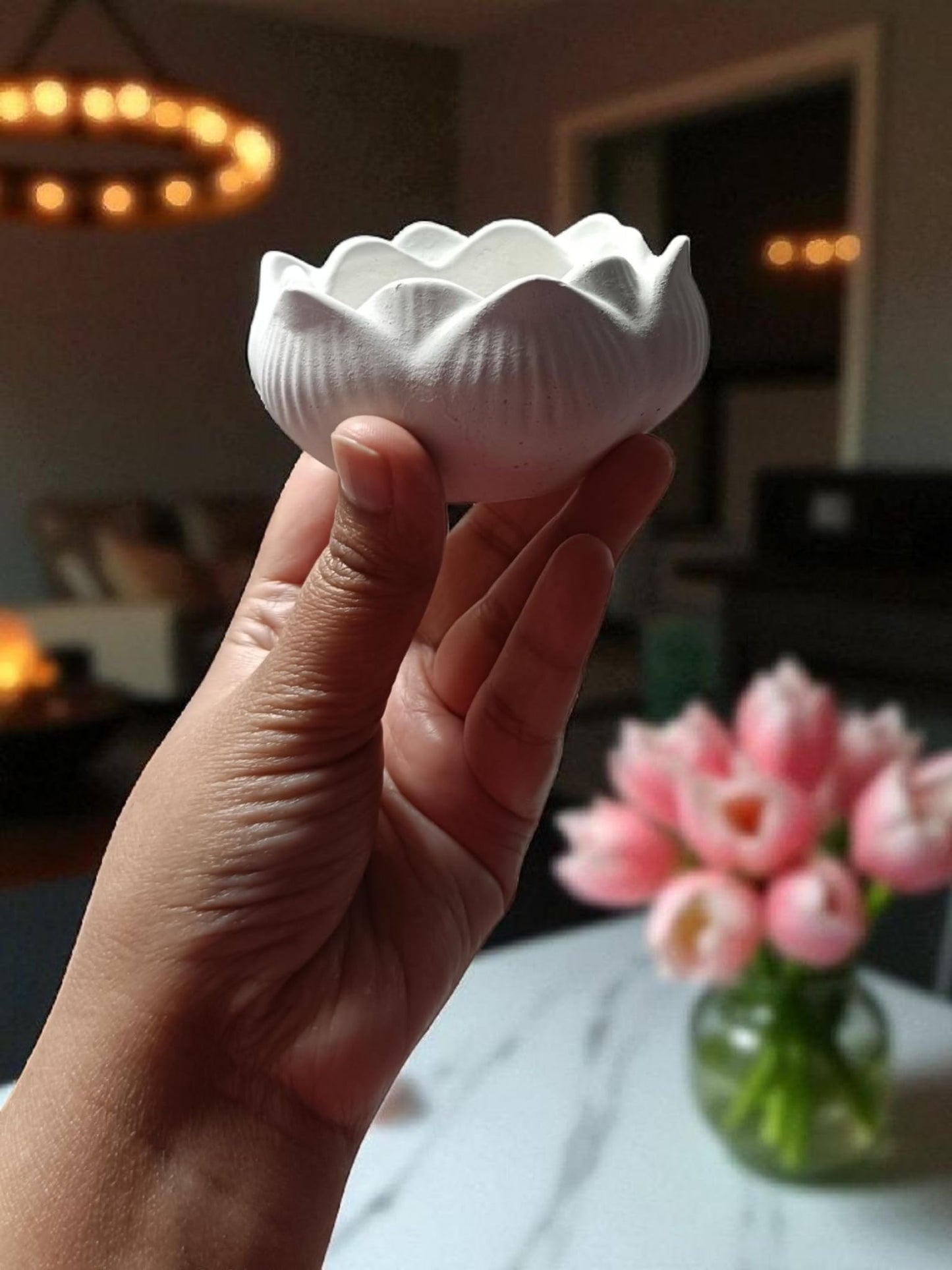 4 louts candle holders