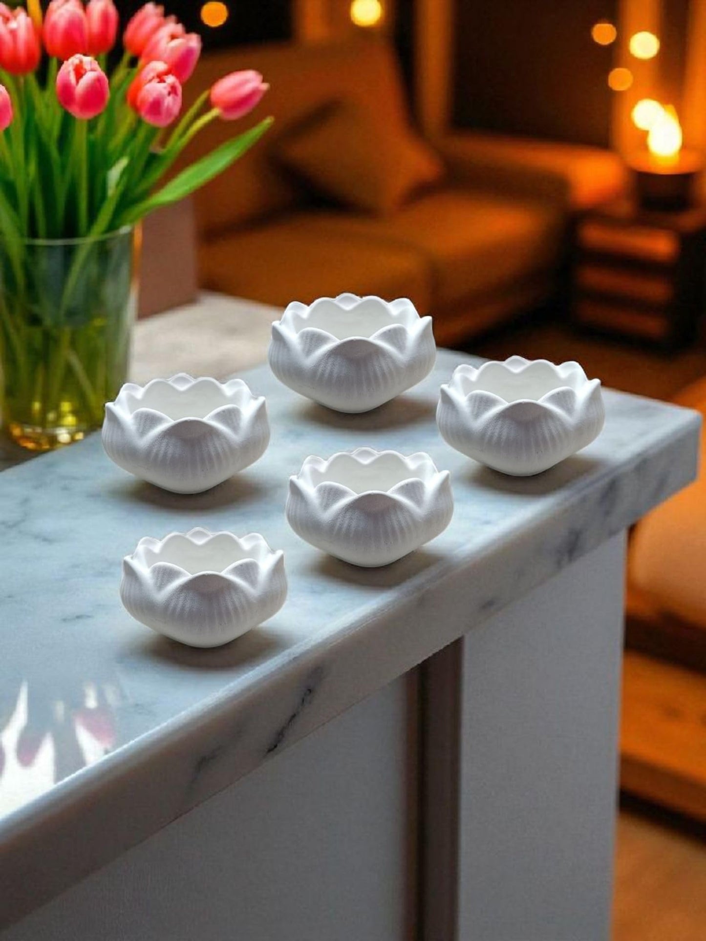 4 louts candle holders
