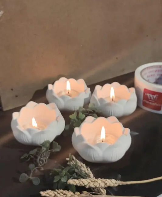 4 louts candle holders